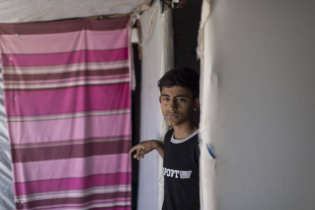 Le 17 mai 2023, Ahmed, 12 ans, de Ramadi, suit des cours dans un centre éducatif informel soutenu par l'UNICEF à Hassan Sham © UNICEF/UN0848016/Ibarra Sánchez