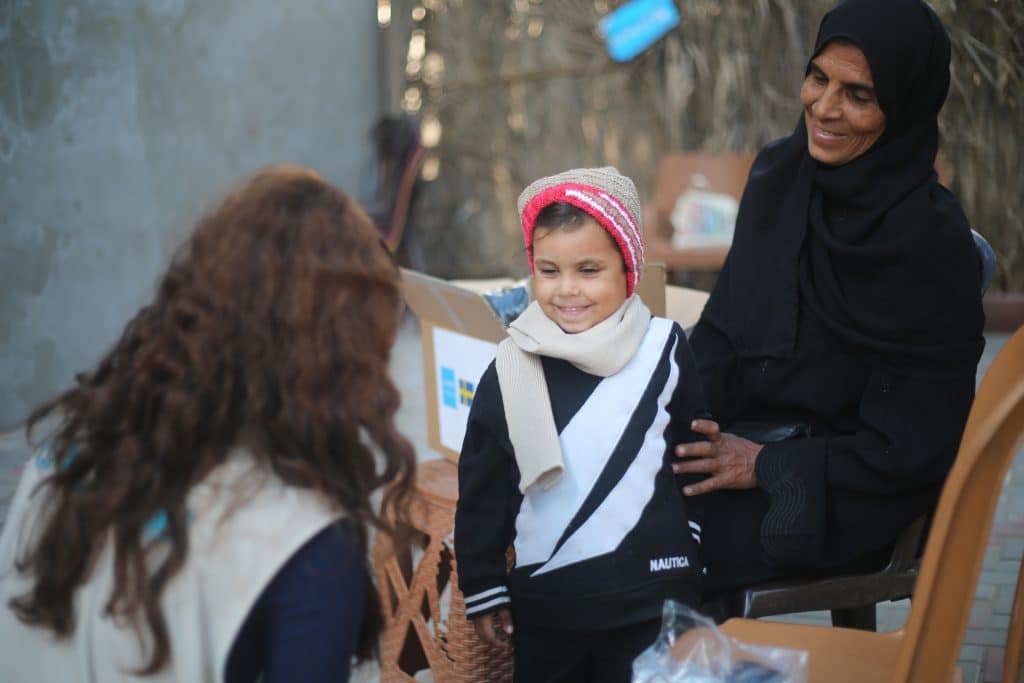 L'UNICEF distribue des kits hiver aux enfants de la bande de Gaza. © UNICEF/UNI909051/El Baba